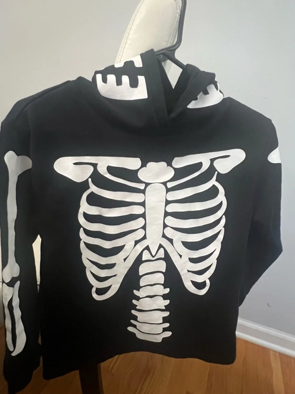 H&M Black Zip-Up Sweater with White Skeleton Graphic